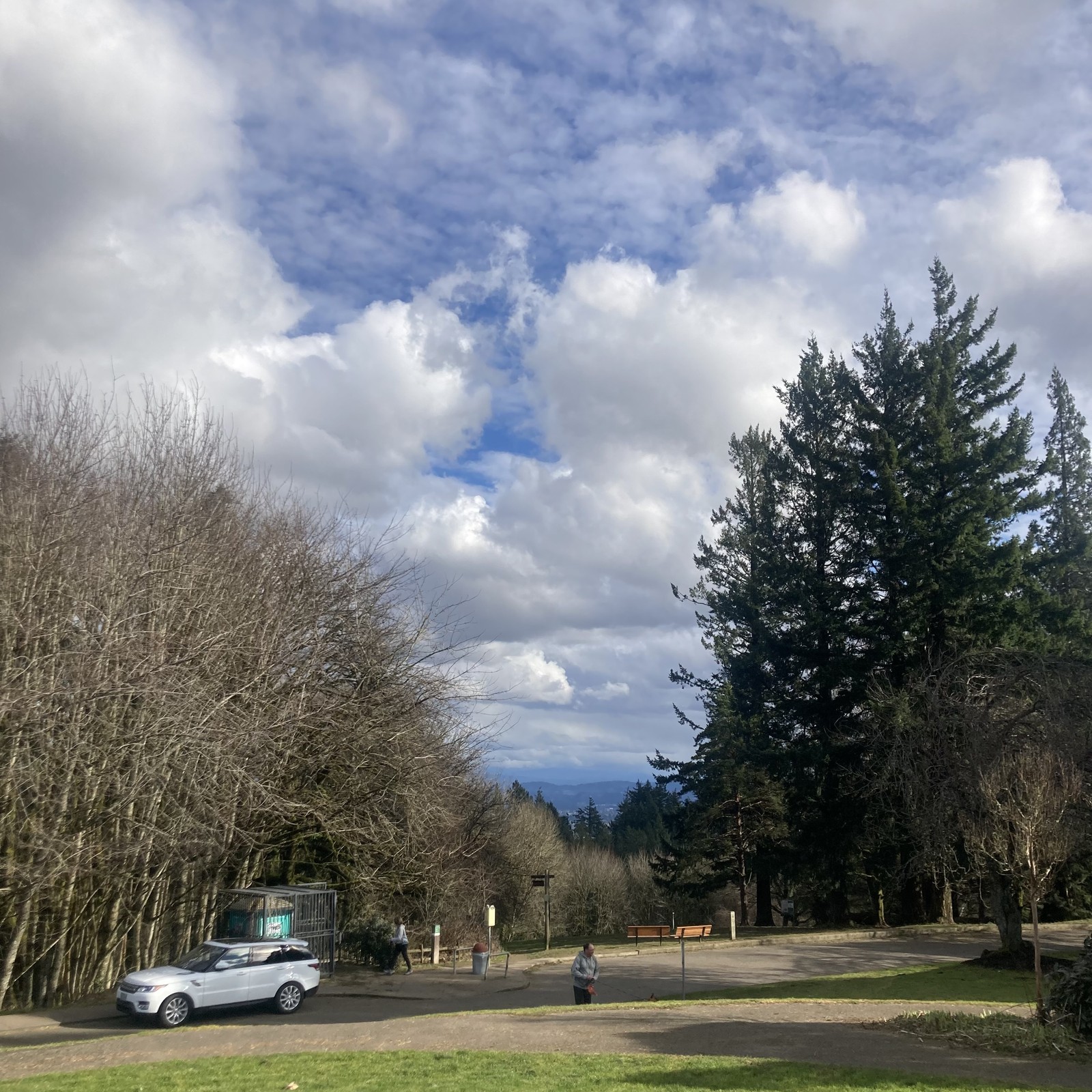 Mt. Hood is hidden by a broken sky that is simultaneously very blue but also very cloudy