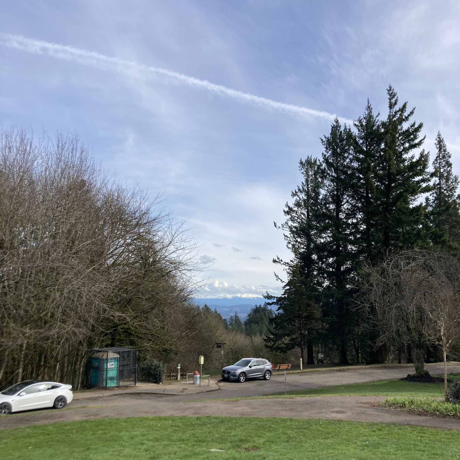 A band of low clouds hides the peak of Mt. Hood
