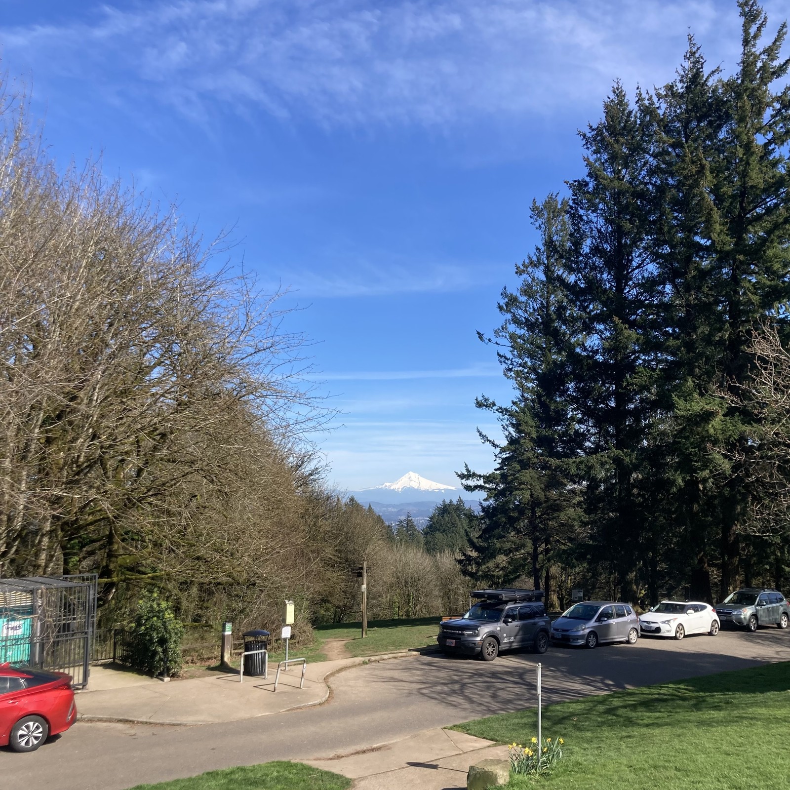 white mountain, green grass, blue sky