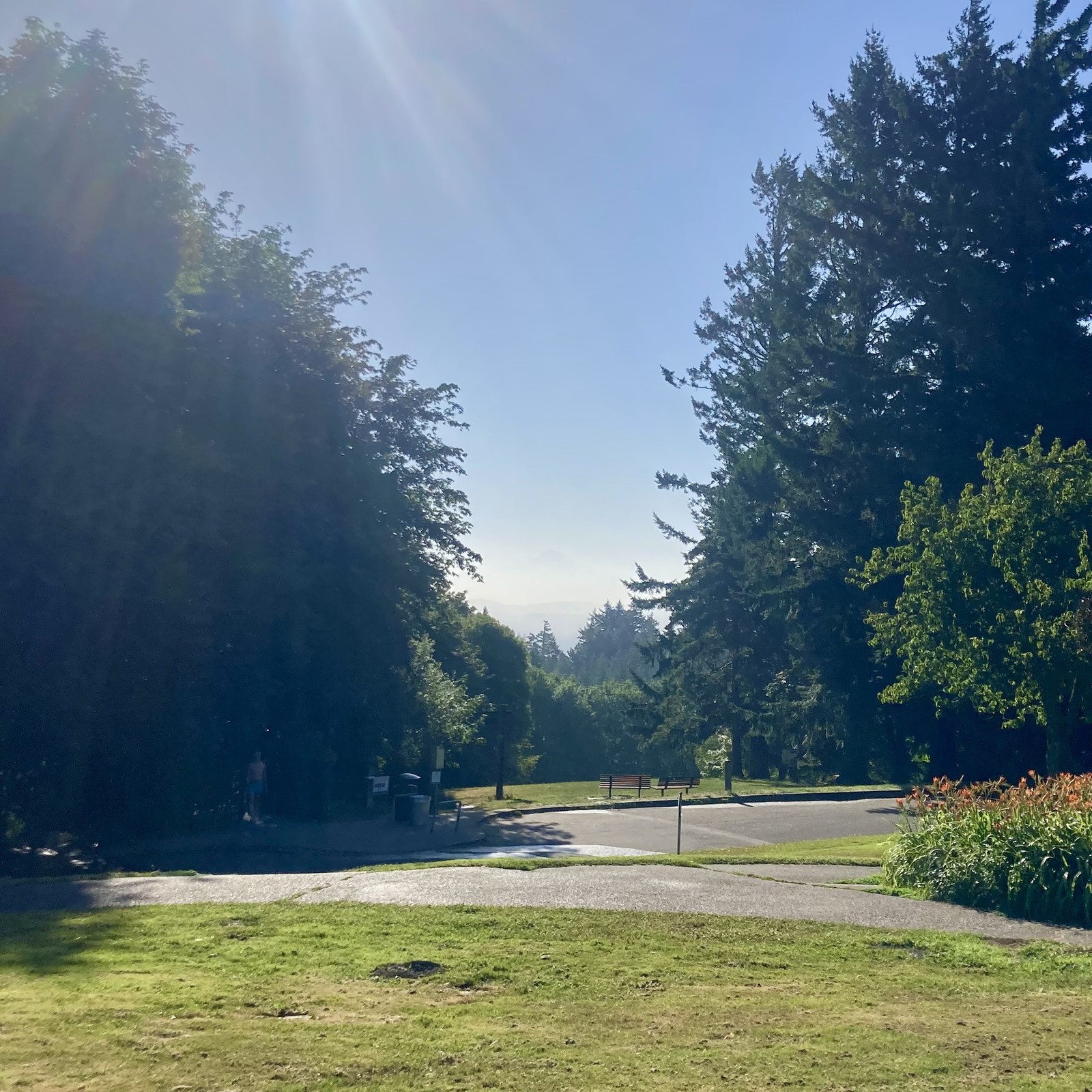 Mt. Hood barely visible through a humid haze on a sunny morning