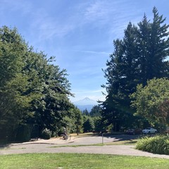 Mt. Hood as seen from Council Crest Park. A few high wispy high altitude clouds in an otherwise clear sky