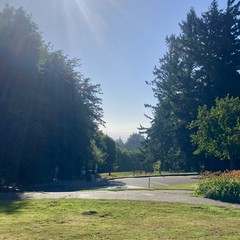 Mt. Hood barely visible through a humid haze on a sunny morning
